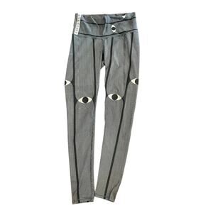 Niyama Sol Rare Eye Candy leggings size Large black and white yoga activewear